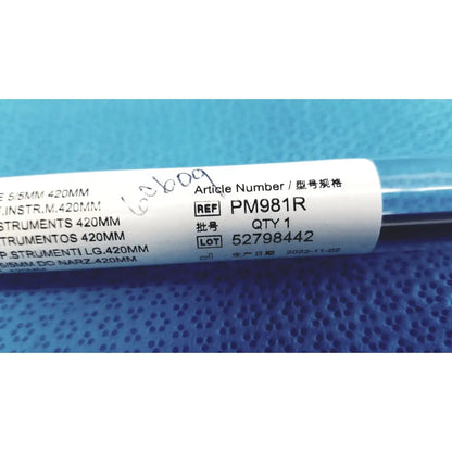 Aesculap laparoscopic grasper ref pm981r with white label pm981r and barcode dated november 2022