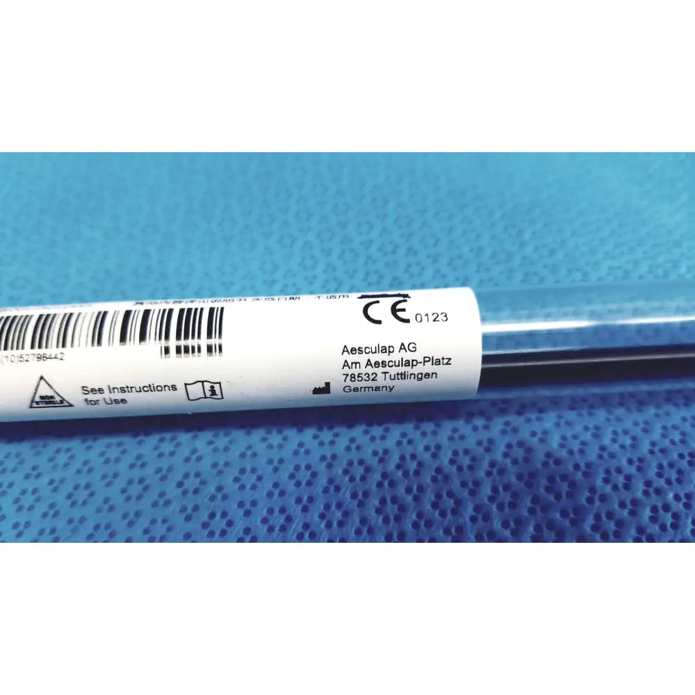 Aesculap laparoscopic grasper ref pm981r metallic instrument with white label showing aesculap ag logo and Germany address