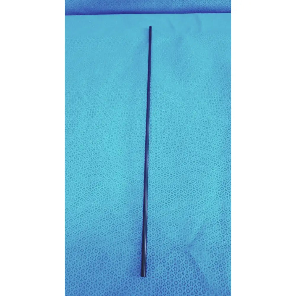 Black cylindrical surgical instrument rod of aesculap laparoscopic grasper ref pm981r for precise tissue handling
