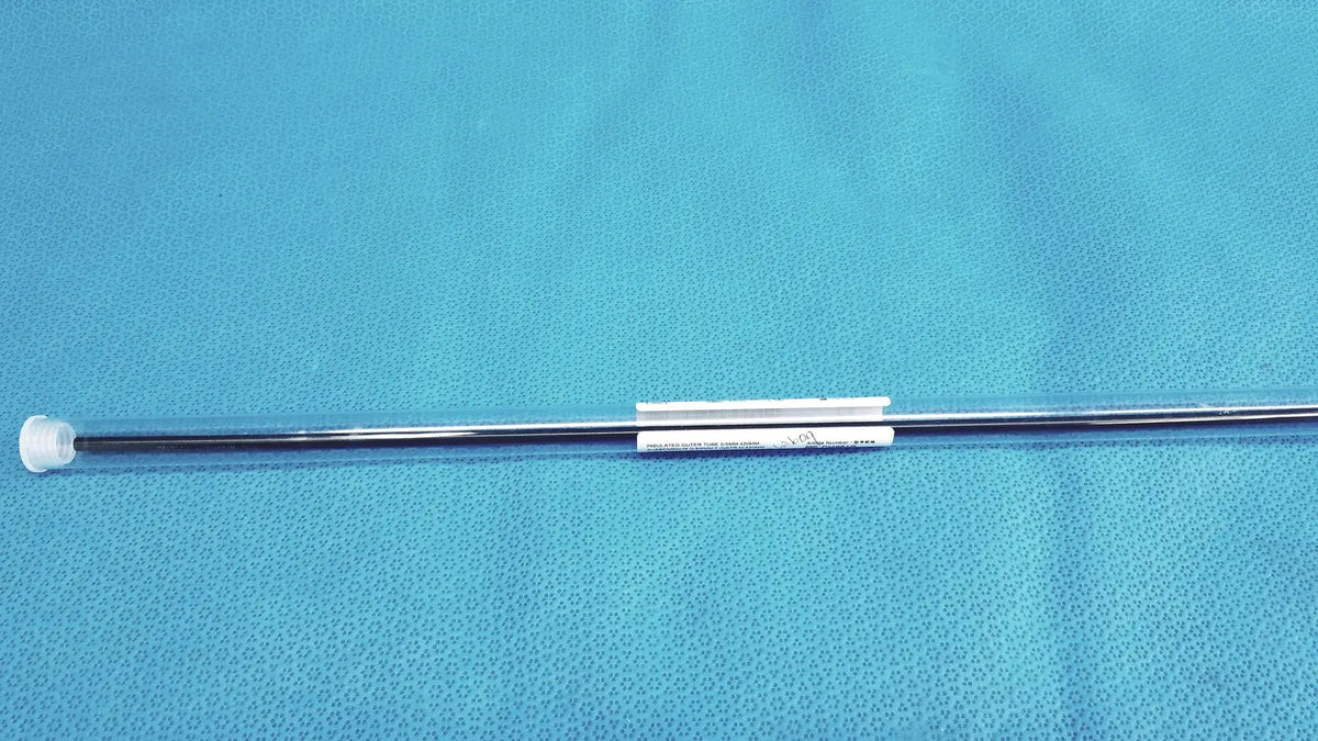 Aesculap laparoscopic grasper pm981r with sleek metallic body and white plastic cap showing labeled section