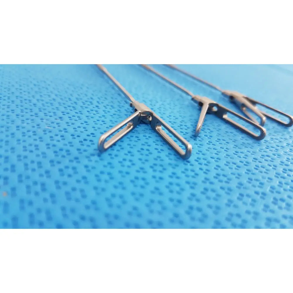 Silver aesculap laparoscopic instrument surgical forceps with sleek metallic finish and precision-engineered jaws reuse medical