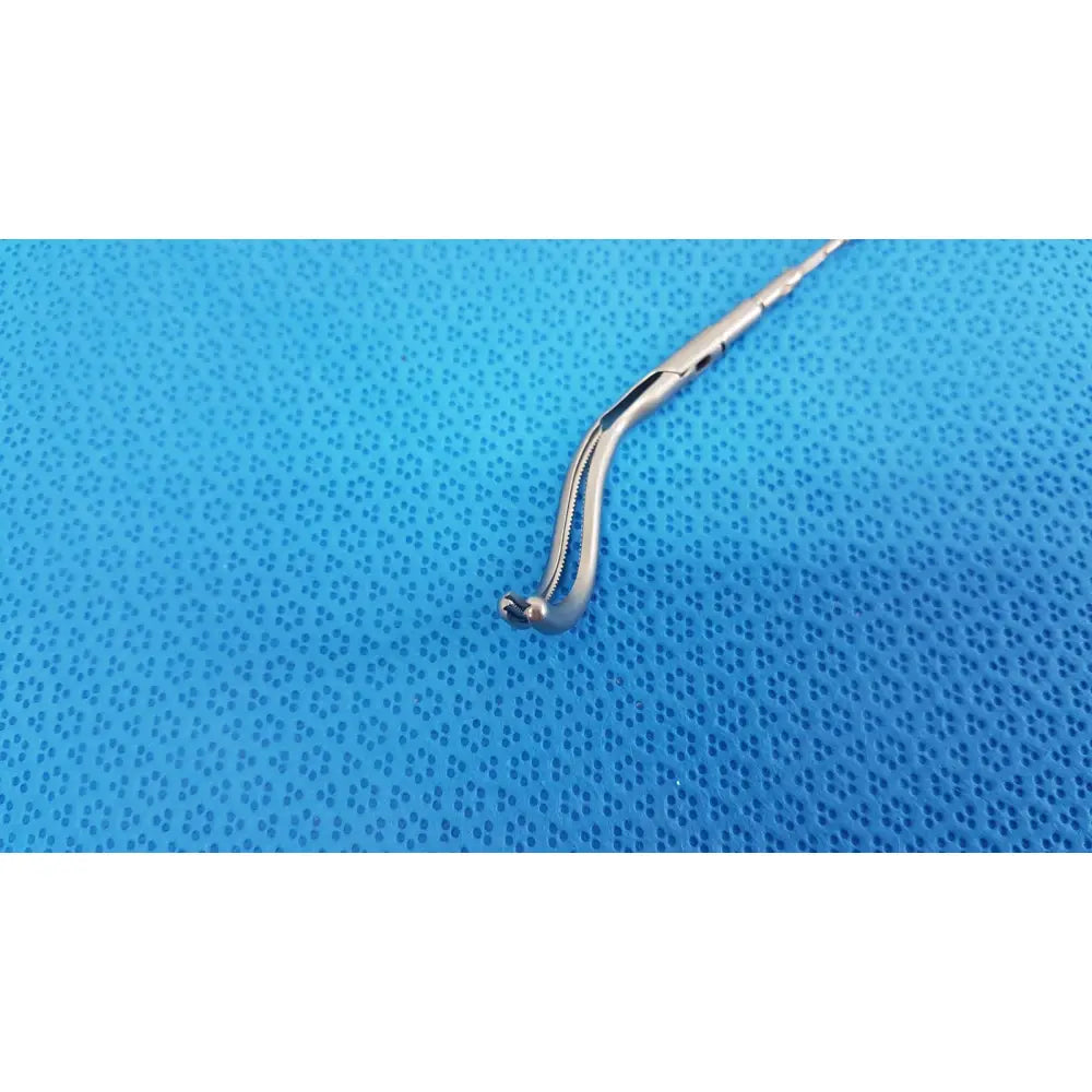 Silver aesculap laparoscopic instrument model pm 716r with curved serrated tip and textured handle for precision surgery