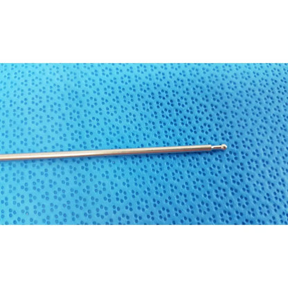 A slender metallic aesculap laparoscopic instrument model pm 716r crochet hook with polished gold finish and rounded tip
