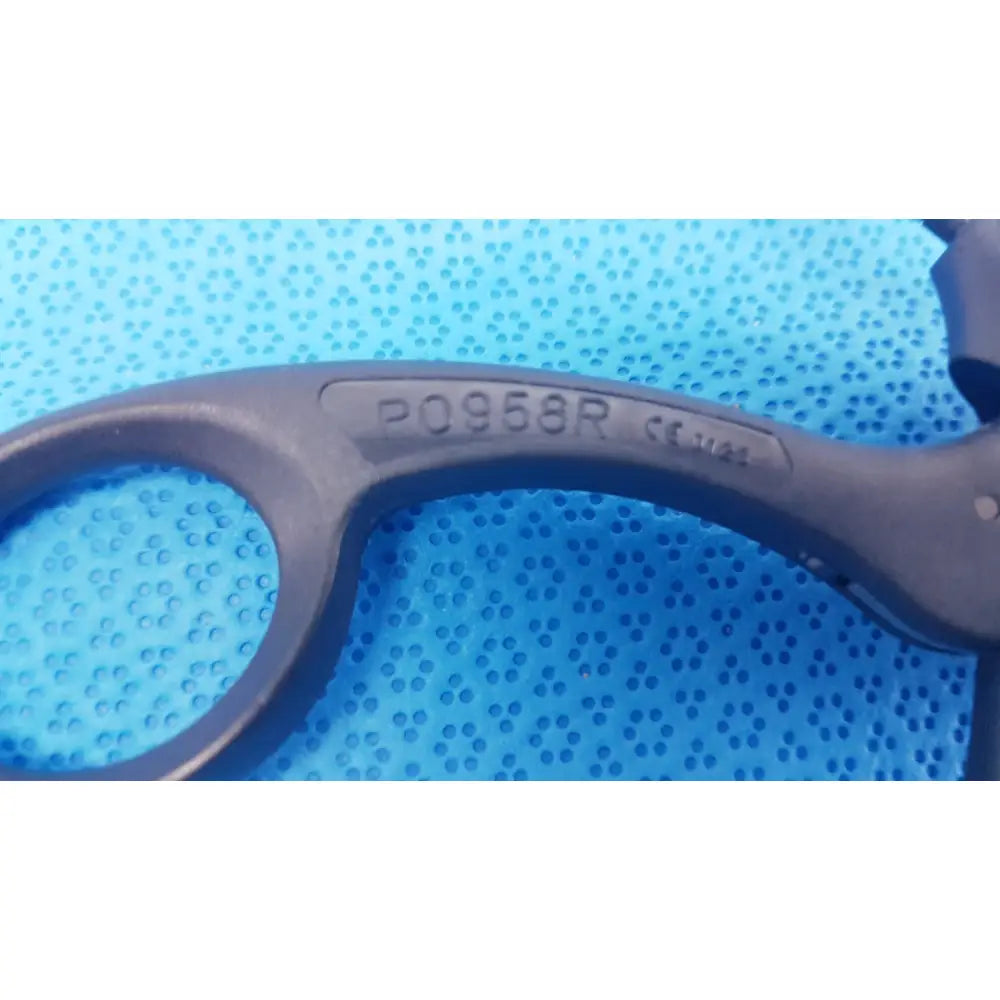 Black plastic aesculap p0958r quick snap non-ratchet laparoscopy handle with engraved model number and certification mark