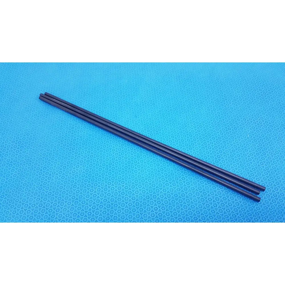 Three black aesculap pm973r insulated outer tubes 5 x 310 mm lie parallel on a blue textured surface in a lot of 3