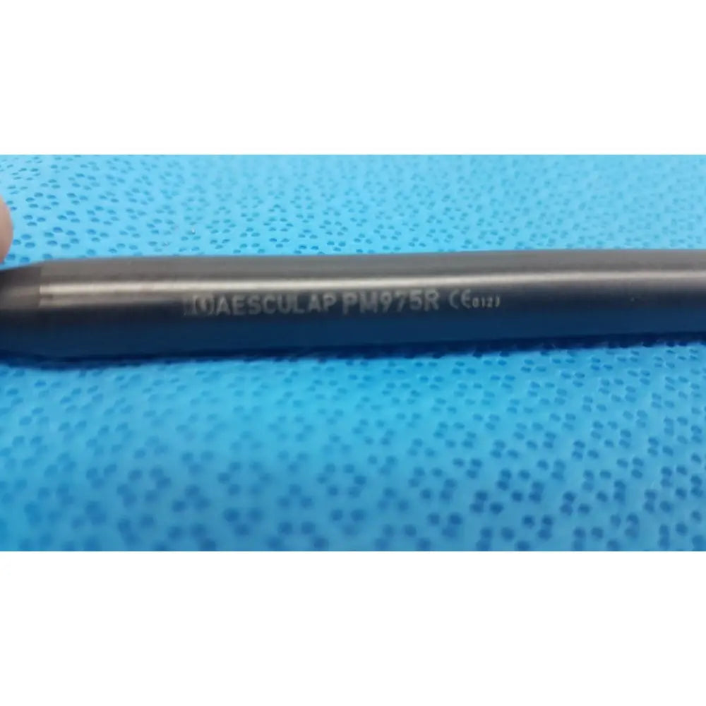 Black aesculap pm975r insulated outer tube converter tbs 5/10 mm with engraved text pm975r ce 0123 on surface