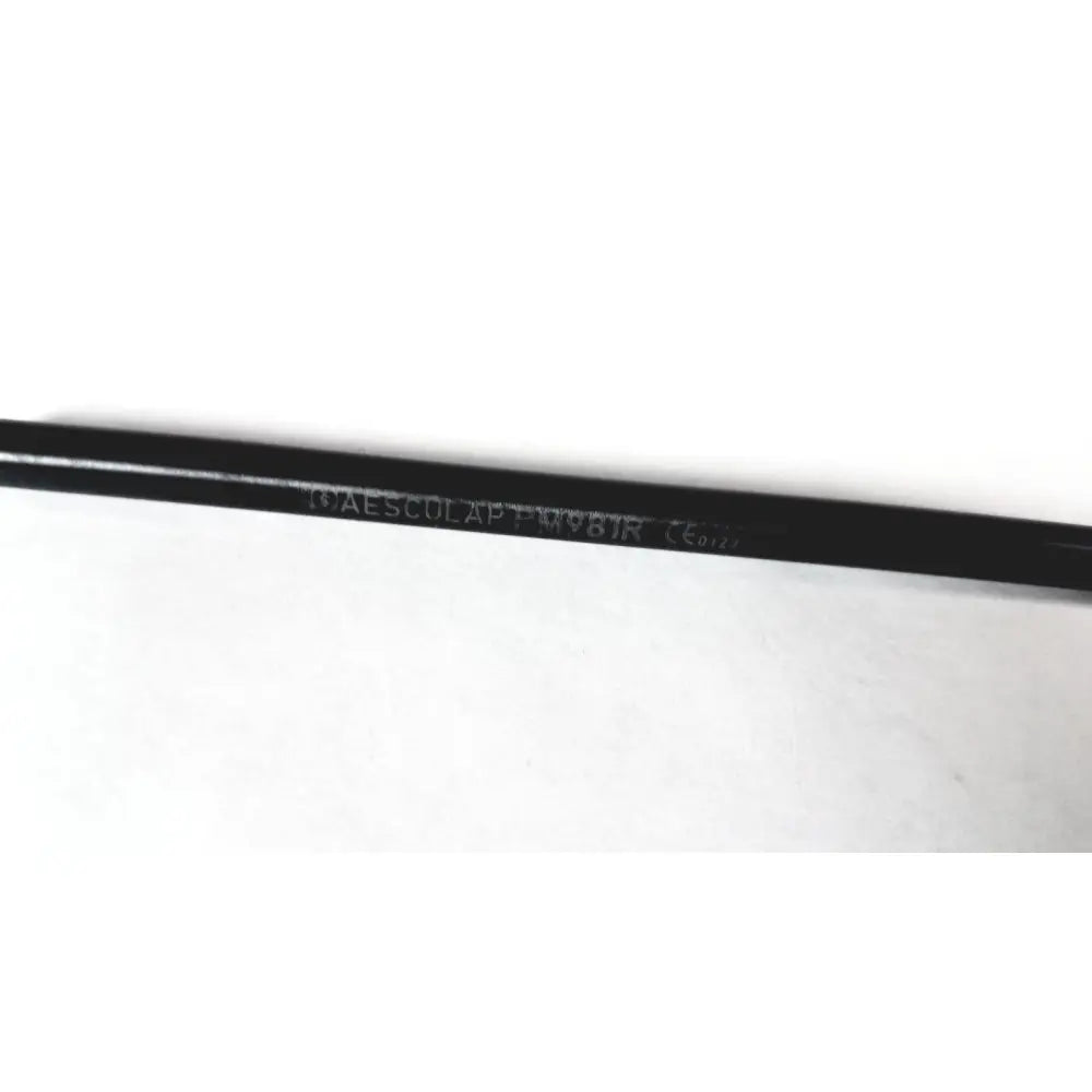 Black cylindrical aesculap pm981r insulated outer tube with embossed text and ce marking for laparoscopic use