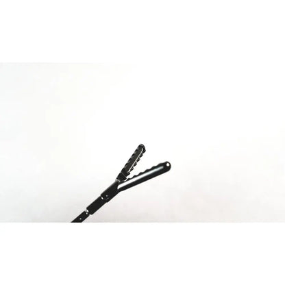 Black aesculap precision dissector surgical instrument with textured grip and serrated jaws for minimally invasive surgery