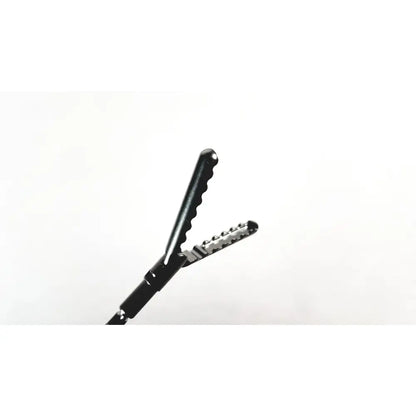 Black aesculap precision dissector surgical instrument with serrated jaws and textured grip for minimally invasive surgery