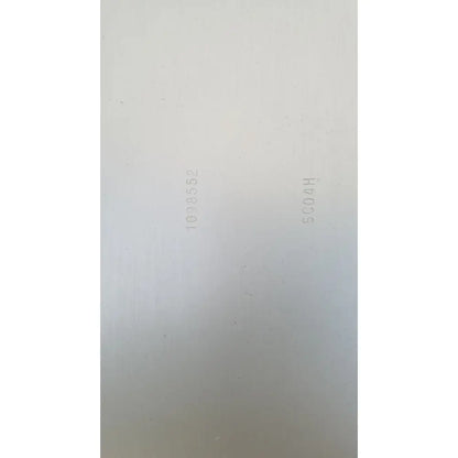 Off-white aesculap sterilization container without lid showing faint alphanumeric codes for sterilization use