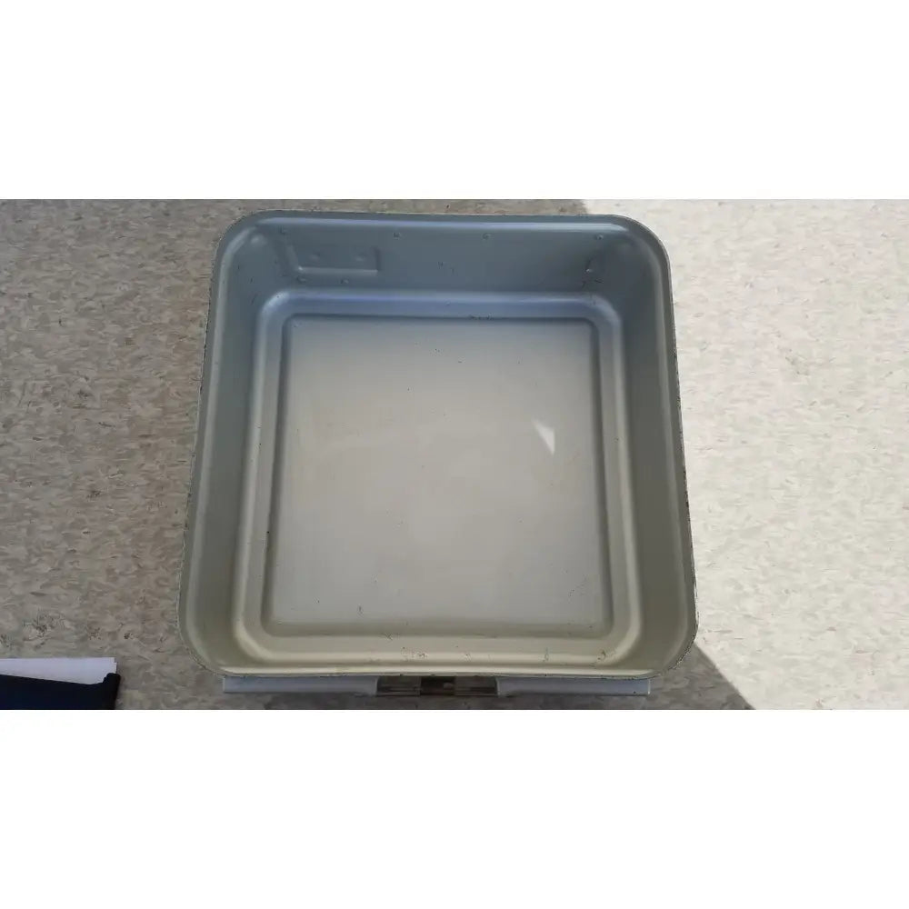 Gray plastic square aesculap sterilization container without lid with rounded corners and slightly raised rim