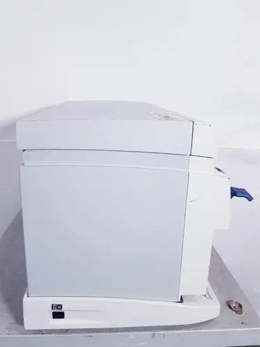 White plastic affymetrix genechip fluidics station 450 with blue lever for precise genechip fluidics control