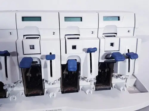 White laboratory automation machine affymetrix genechip fluidics station 450 with four numbered blue handle stations