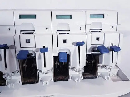 White laboratory automation machine affymetrix genechip fluidics station 450 with four numbered blue handle stations