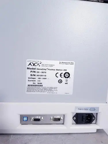 White affymetrix genechip fluidics station 450 laboratory instrument with label showing model and specifications