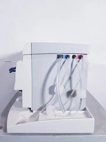 White plastic laboratory pump with three colored connectors and clear tubing for affymetrix genechip fluidics station 450