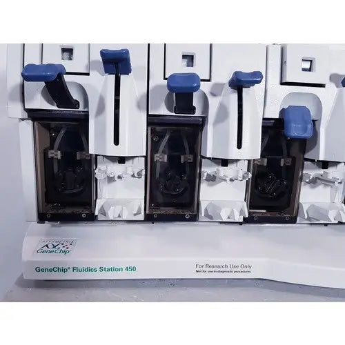 Affymetrix genechip fluidics station 450 in white and blue with black internal components for precise fluid handling