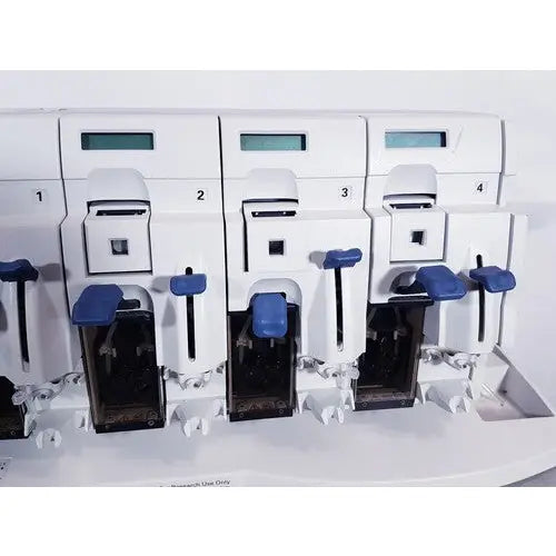 White laboratory automation machine affymetrix genechip fluidics station 450 with four numbered blue handle stations