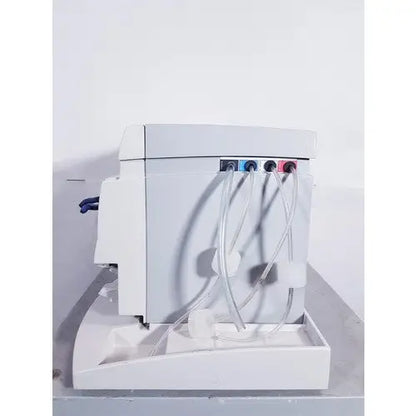 White plastic laboratory pump with three colored connectors and clear tubing for affymetrix genechip fluidics station 450