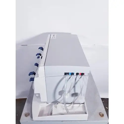 Gray plastic affymetrix genechip fluidics station 450 with blue black and red connectors for genechip fluidics use