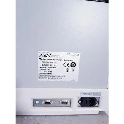 White affymetrix genechip fluidics station 450 laboratory instrument with label showing model and specifications