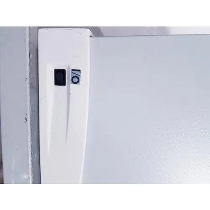 White refrigerator door with black power switch and circular sticker on affymetrix genechip fluidics station 450