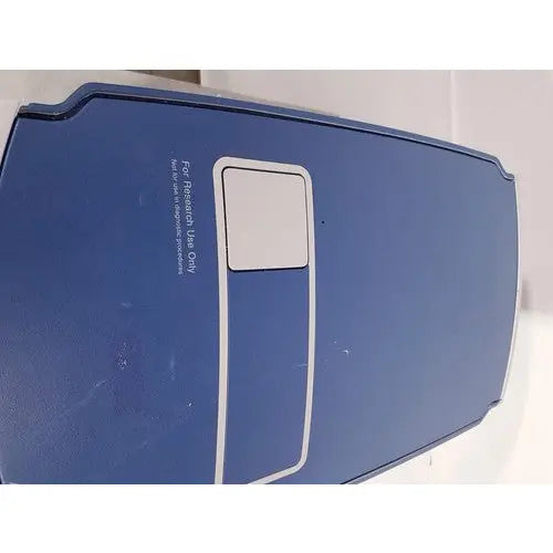 Blue rectangular affymetrix genechip scanner 3000 with white panel and silver trim labeled for retail use only for reuse medical