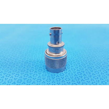 Silver Agilent N-Type female to bnc male coaxial adapter with knurled grip and threaded collar for male RF coaxial use
