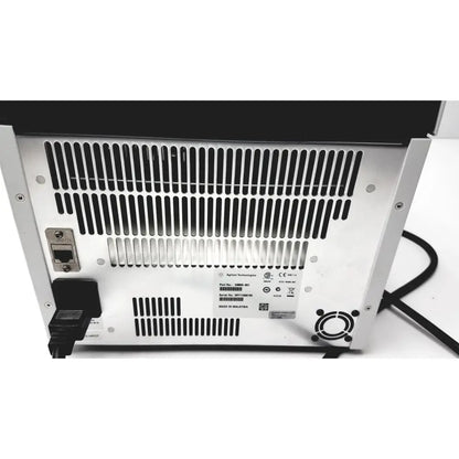 Silver metallic agilent surecycler 8800 touch screen thermal cycler with black ventilation slats and side power port