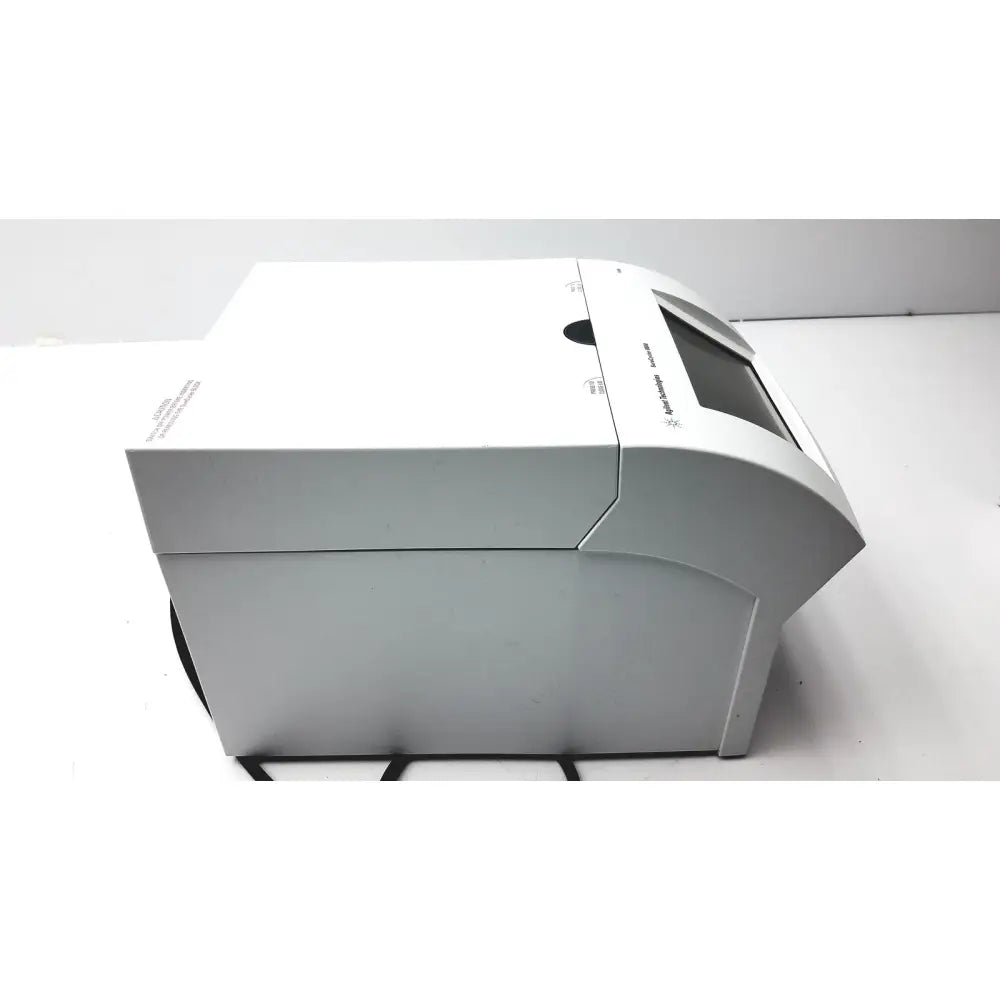 White sleek agilent surecycler 8800 touch screen thermal cycler with small screen and branded logo on front panel