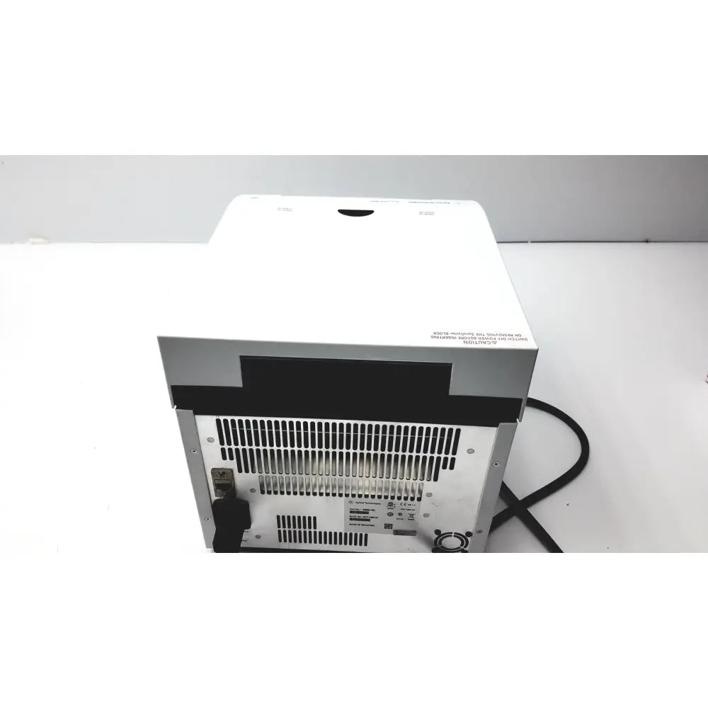 Back view of the white and gray agilent surecycler 8800 touch screen thermal cycler with black ventilation grille