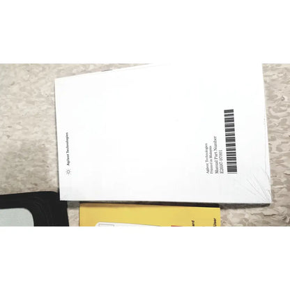 White paper manual with barcode and part number for agilent technologies e2697a high impedance adapter product