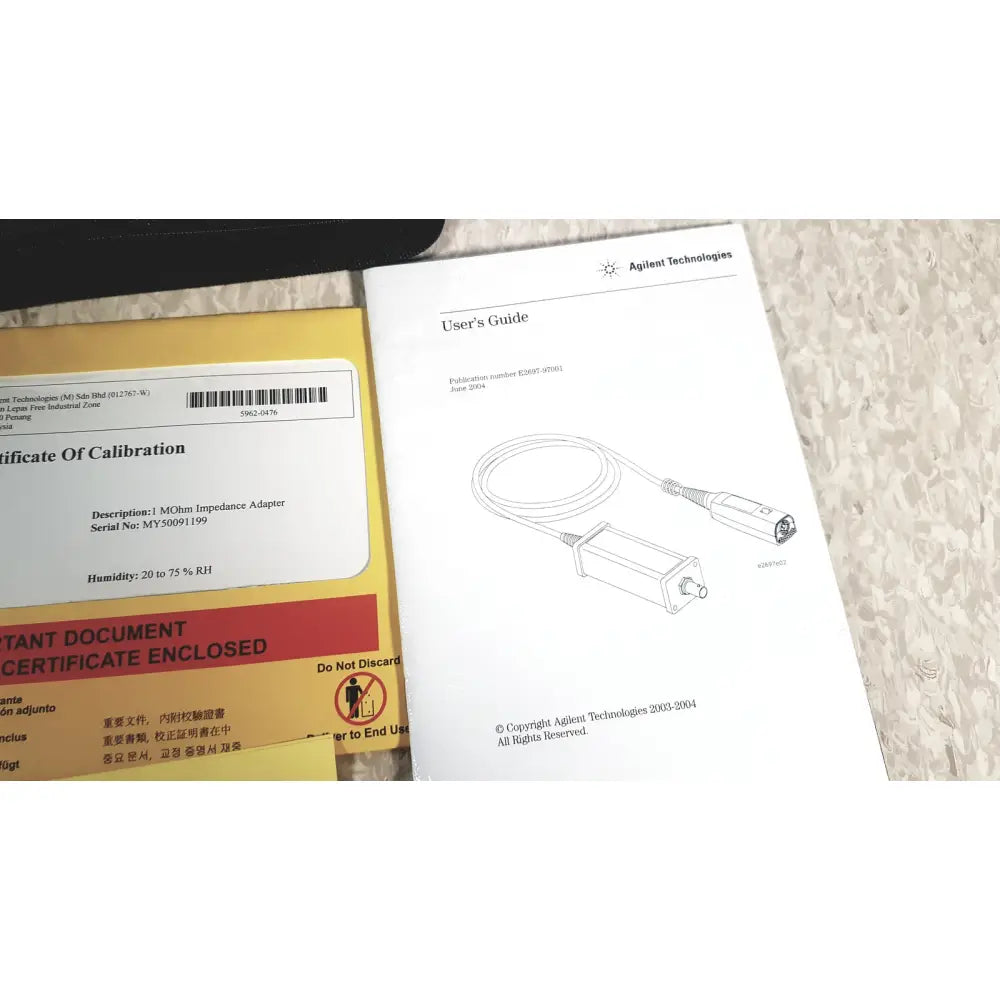 Yellow certificate of calibration for agilent technologies e2697a high impedance adapter in product papers
