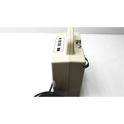 Beige portable oxygen concentrator with handle and control panel for aircast venaflow 30a vascular system use