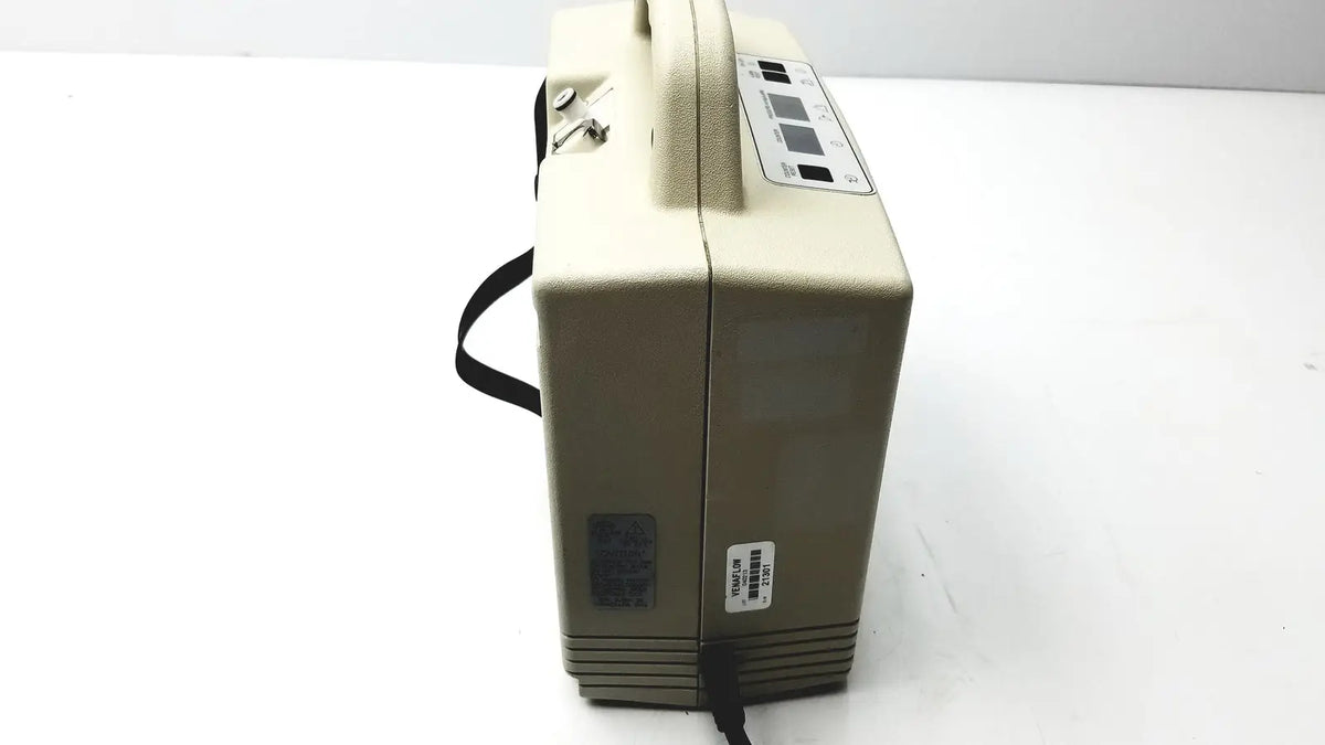 Beige portable aircast venaflow 30a vascular system with handle control panel and power cord for compression therapy