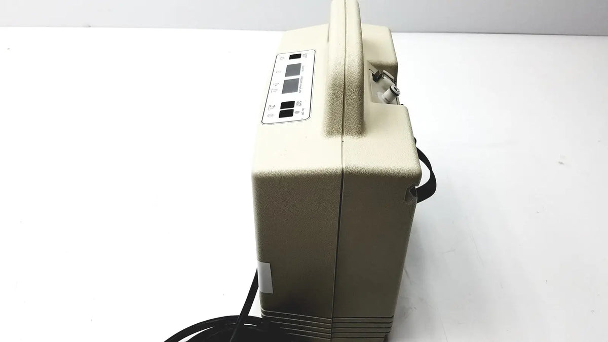 Beige portable oxygen concentrator with handle and control panel for aircast venaflow 30a vascular system use