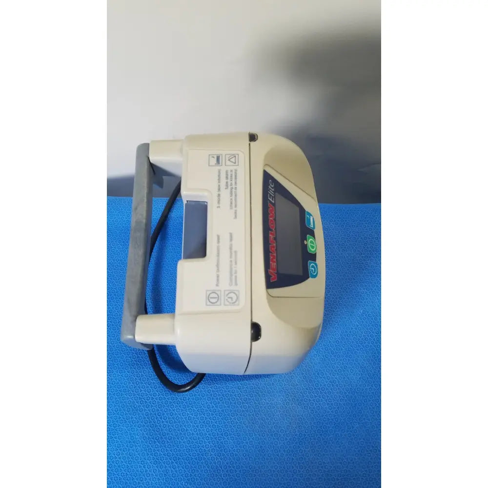 Beige medtronic infusion pump with digital display and control buttons for aircast venaflow elite dvt prophylaxis model 30bs