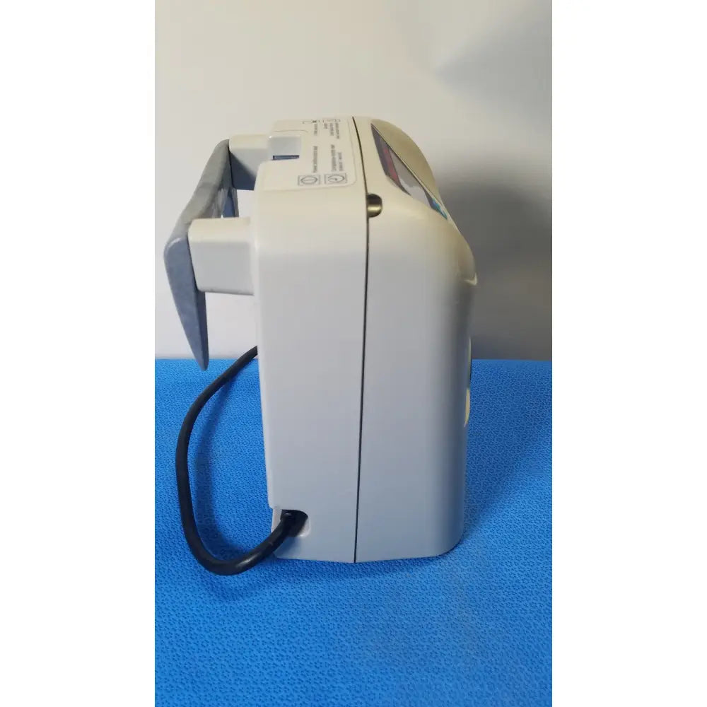 Gray plastic banknote counter with black power cord and digital display featured alongside aircast venaflow elite dvt pump