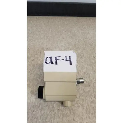 Beige plastic af-4 airco vacuum regulator with black and metallic fittings for precise airco vacuum control