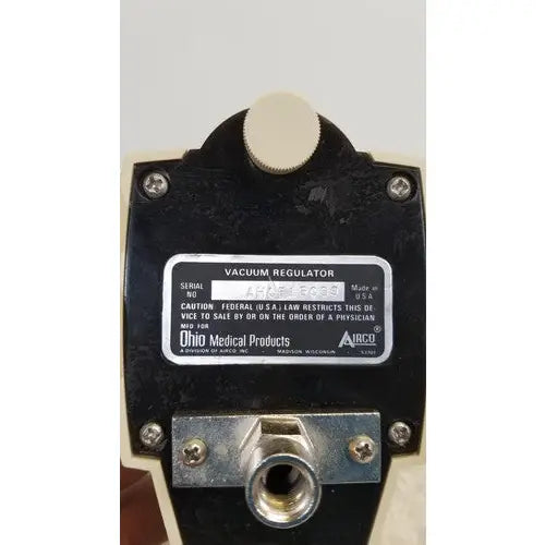 Black plastic airco vacuum regulator with white knob and metallic fittings for precise vacuum control