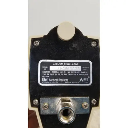 Black plastic airco vacuum regulator with white knob and metallic fittings for precise vacuum control