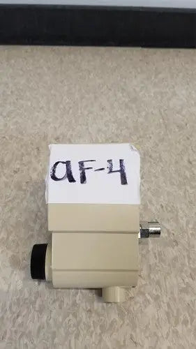 Beige plastic af-4 airco vacuum regulator with black and metallic fittings for precise airco vacuum control