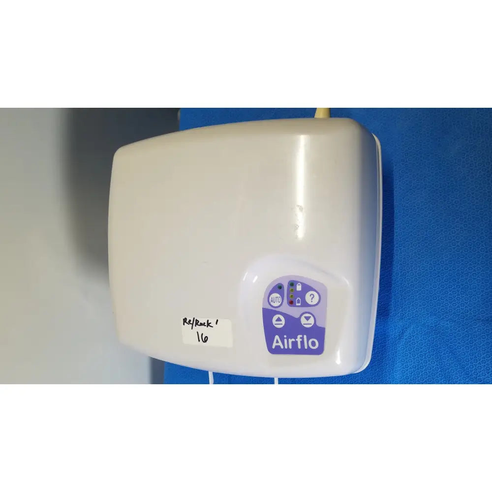 White plastic airflo wall-mounted hand dryer with purple control panel is a bathing cushion air compressor device