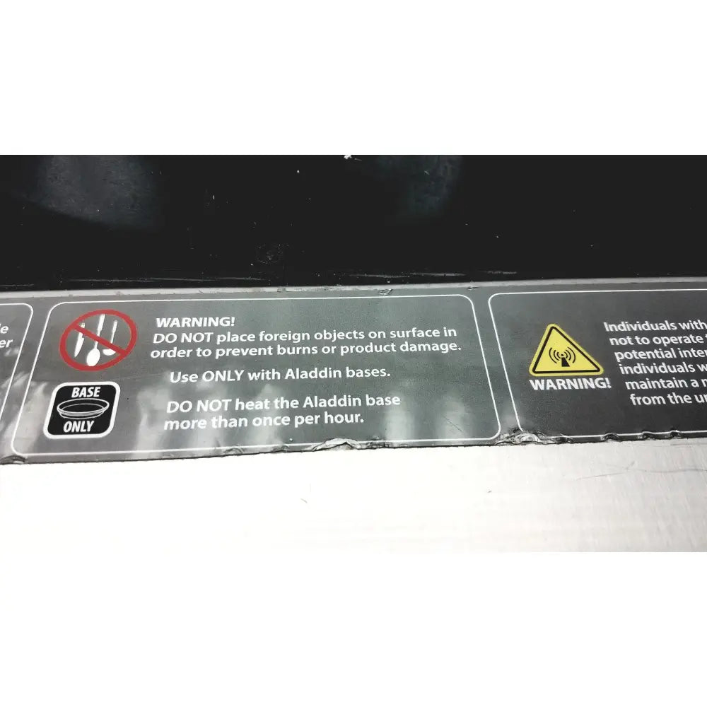 Back side of aladdin temp-rite heat on demand advantage RS plus plate heater packaging with warning labels and instructions