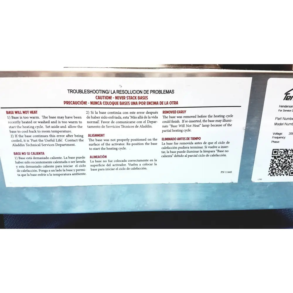 White paper label with bilingual troubleshooting instructions on the back of aladdin temp-rite heat on demand advantage rs+ plate heater