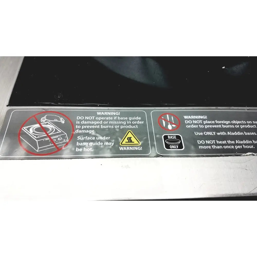 Aladdin temp-rite heat on demand advantage rs plus plate heater base with black surface and silver safety warning label