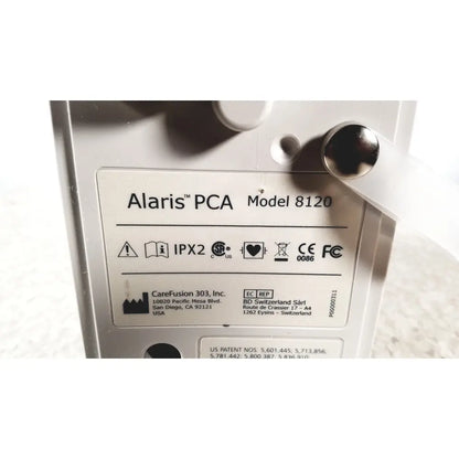 Silver alariis pca model 8120 medical device back with certification labels and manufacturer information without keys
