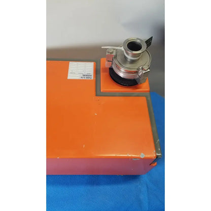 Orange rectangular metal vacuum pump station with silver mechanical coupling mounted on top by alcatel drytel