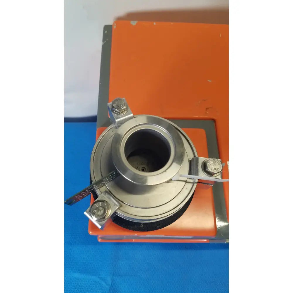 Silver metallic flange with three bolted mounting brackets and central hollow bore for alcatel drytel vacuum pump station