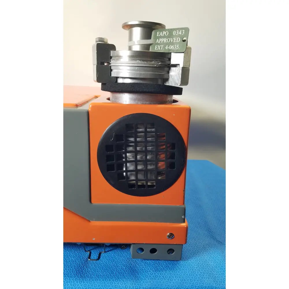 Alcatel drytel 31 vacuum pump station with orange and gray industrial vacuum pump and metallic top assembly